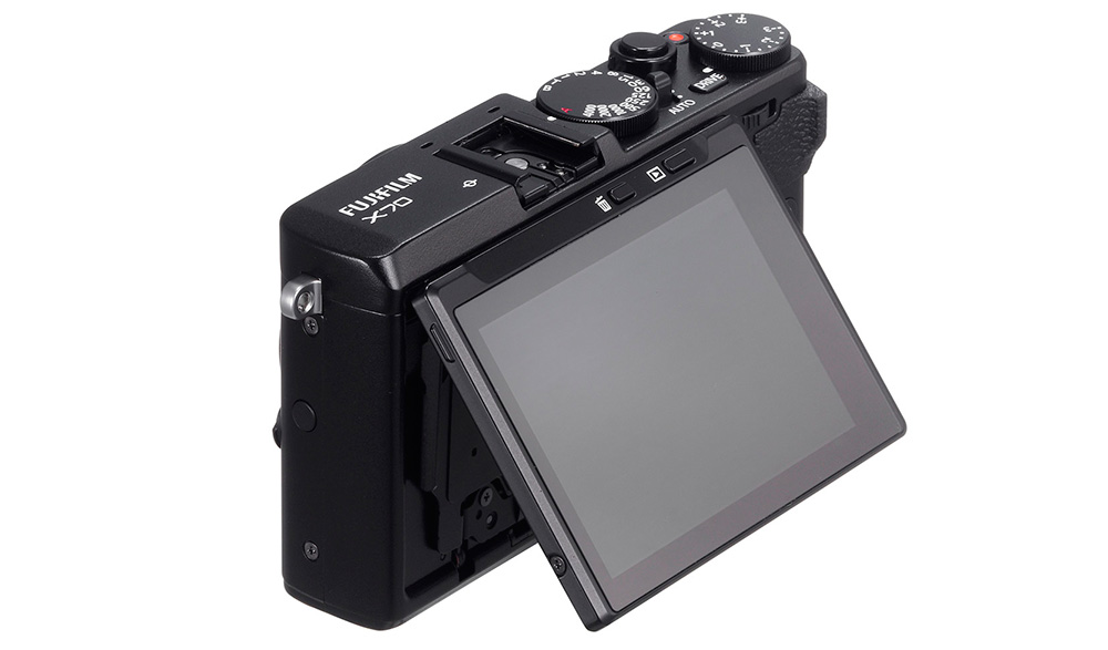 Fujifilm X70: У камеры есть поворотный дисплей для съемки «селфи» и модуль Wi-Fi для беспроводной передачи данных и дистанционного управления.